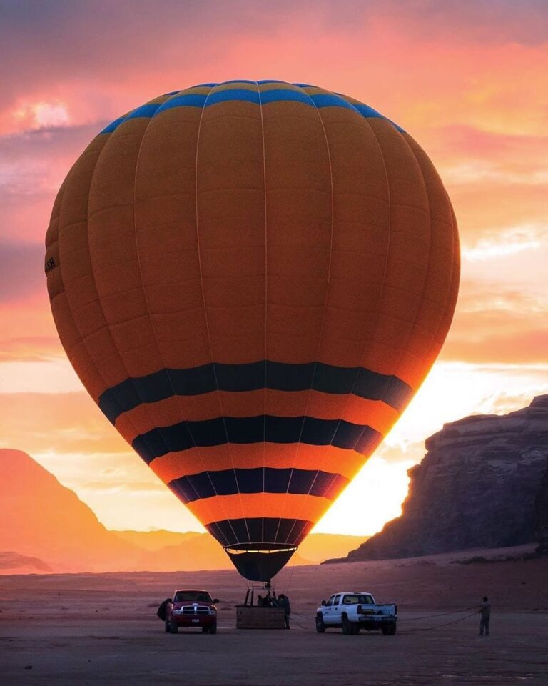 Hot air balloon in Wadi Rum at sunrise